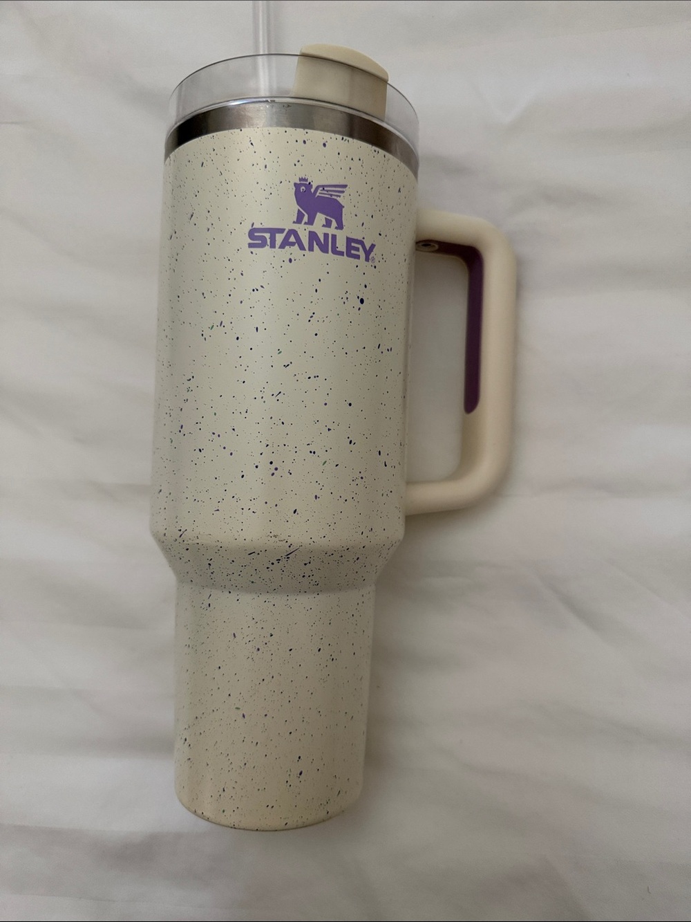 Stanley Ivory Speckle Travel Mug with Purple Logo and Handle Accent